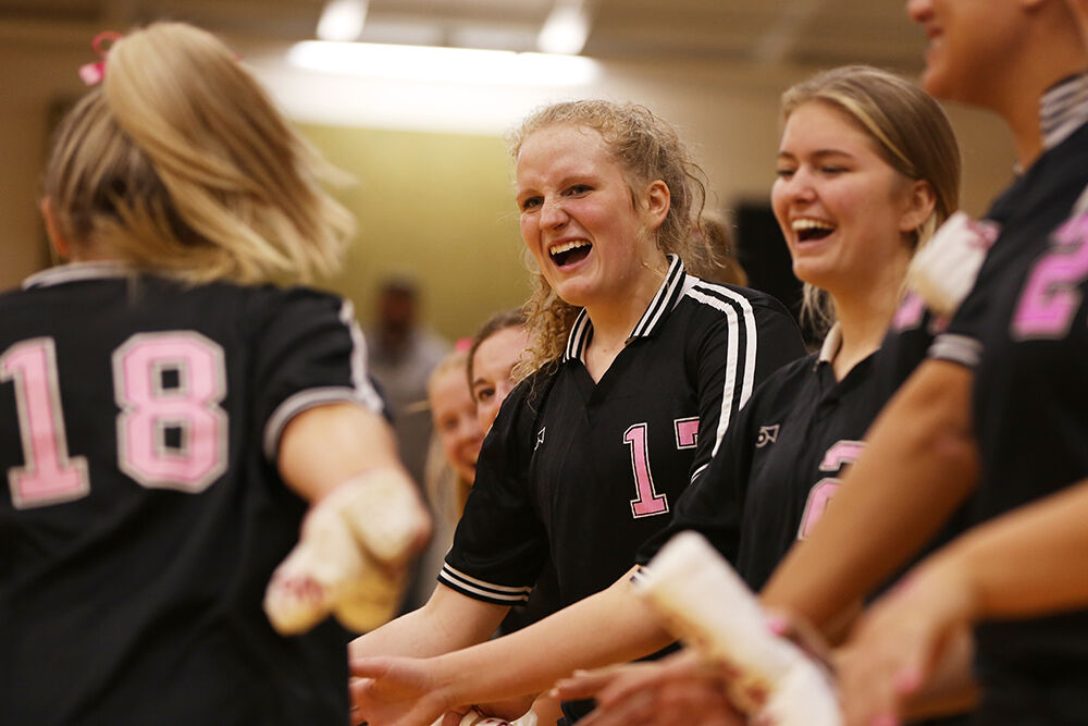 Tessa Taylor laughs as teammate and starter Holland Stowe is announced